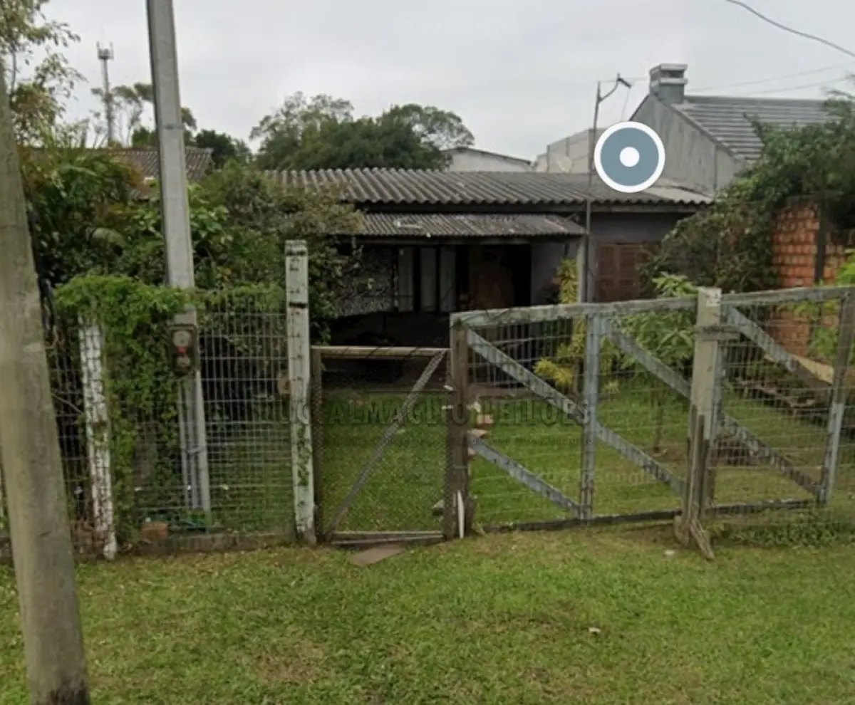 LOTE 001 - casa na Rua Olmiro Lima 451,