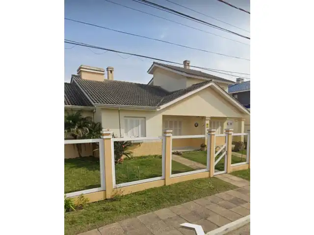 excelente sobrado em Capão Novo, na Rua das Orquideas, nr. 3871, casa 103, bloco B, e vaga de estacionamento nr. 05