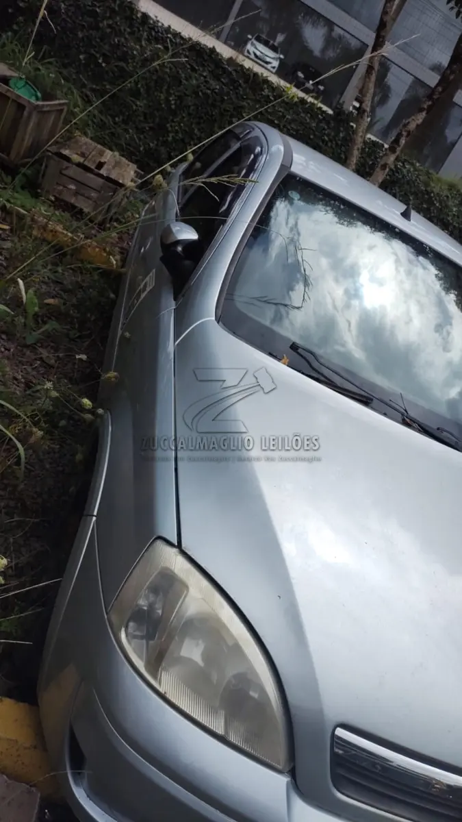 LOTE 012 - AUTOMOVEL Corsa Sedam Premium 1.4 - marca GM  IRN-3155
