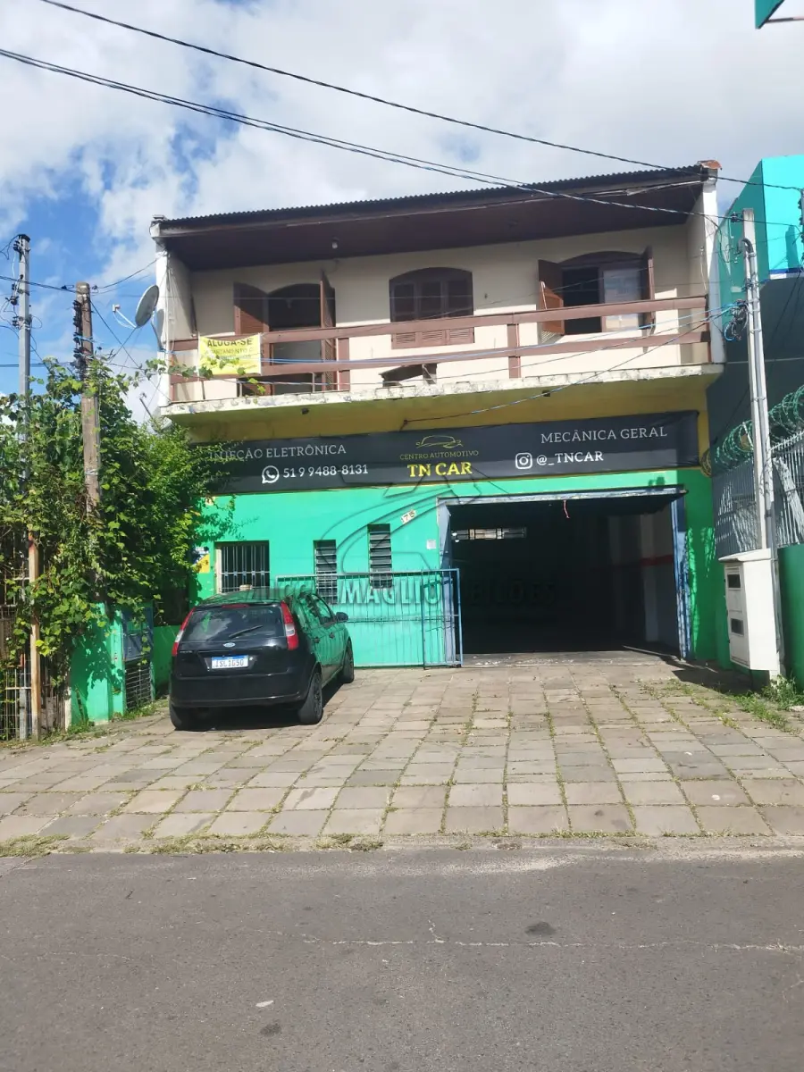 LOTE 001 - prédio de construção mista com aproximadamente 220m2, situado na Cel. Aparício Borges nr.175 , Bairro Glória