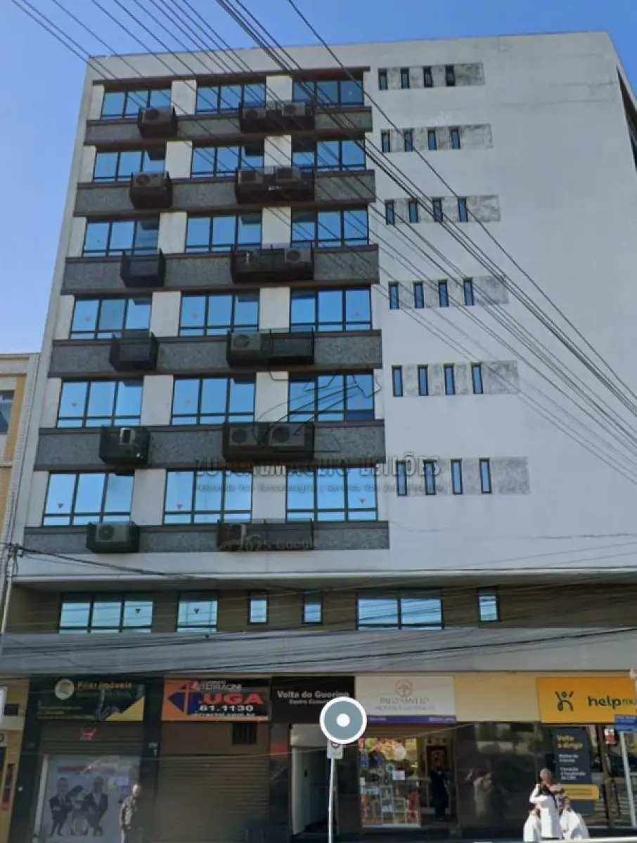 LOTE 001 - conjunto comercial nr. 204, do Edificio  Centro Comercial volta do Guerino, na av. Assis Brasil nr. 1800, localizado no 1 andar, com area total de 26,060m2, e util de 22,46m2.