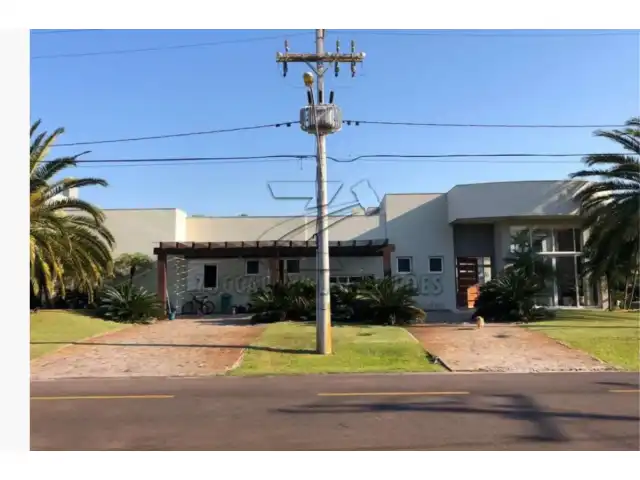 Mansão de lote nr. E 40 e E 41  dividindo-se com o lote 42,  área real privatival de 974,74m2 área real total de 2.541,51m2, corresponde a dois terrenos , Condomínio Enseada Lagos Xangri-lá,